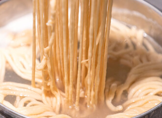 Preparing the tradionanl swabian pasta spaetzle