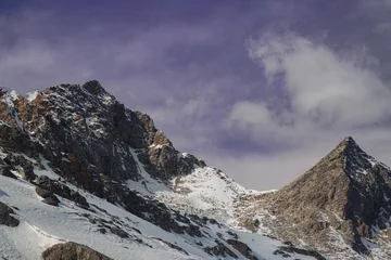 Gordijnen Exploring majestic mountain peaks snowy landscape in the high alps scenic photography © InfoSoul