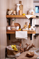 wooden shelf with accessories and cleaning products for washing, eco-friendly cleaning