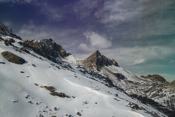 Majestic snow-capped peaks alpine mountains scenic photography winter wonderland aerial view...
