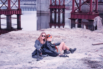 Urban Adventure With Friends Under City Bridge by the River