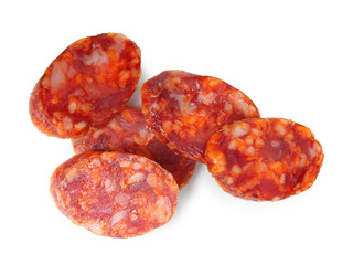 Pieces of delicious dry cured sausage isolated on white, top view