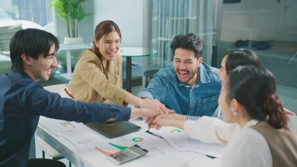 Business team putting hands together on top of each other , Collaborate business team success concept Teamwork and Collaboration Connecting