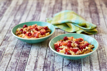 cherry dump cake served in a bowls