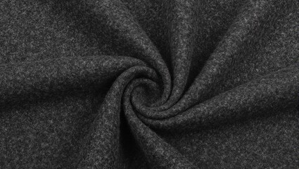 Luxurious charcoal gray wool fabric with fine woven texture Perfect for high end winter wear