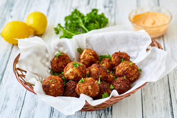 fried crab fritters served with a spicy remoulade sauce