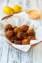 fried crab fritters served with a spicy remoulade sauce