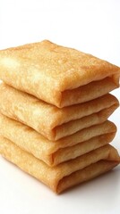 Crispy golden spring rolls stacked high on a white surface showcasing their texture and inviting culinary appeal highlighting the savory delight