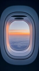 Breathtaking Aerial View Through an Airplane Window at Sunset