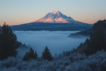 Majestic Mountain Peak Kissed by Sunrise Light Above a Sea of Fog in a Serene Landscape View from Above