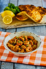 shrimp scampi topped with fresh lemon and parsley served with Texas toast