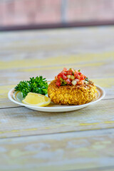 crispy fried crab cakes topped with pico de gallo