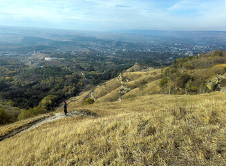 Tourists on the slope of Maloe Sedlo mountain, Kislovodsk National Park