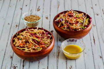 red and green cabbage coleslaw made with a mustard vinegar dressing