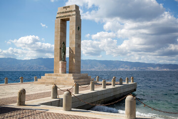 Statue of Athena under a tribute arch to King Vittorio Emanuele III located on the seafront of...