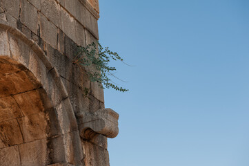 Obraz premium Ancient historical arch ruins in the ancient City in Patara, Turkey against sky ba