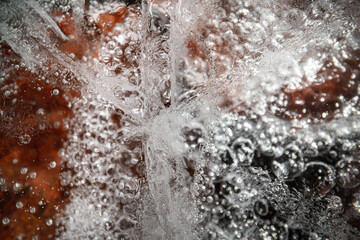 Ice texture with cracks, bubbles and frozen leaves for computer graphics, texturing, compositing or as a background