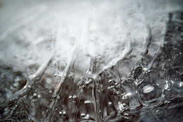 Close up macro shot of melting Ice - texture for computer graphics, texturing, compositing or as a background