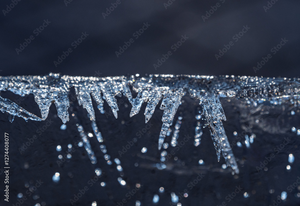 Poster close up macro shot of tiny ice formations around an ice block