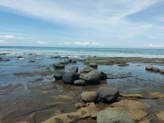 Enjoying the ocean view at Yeh Leh beach, Bali.