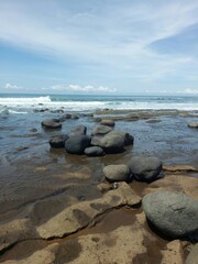 Enjoying the ocean view at Yeh Leh beach, Bali.