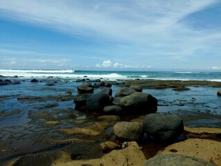Enjoying the ocean view at Yeh Leh beach, Bali.