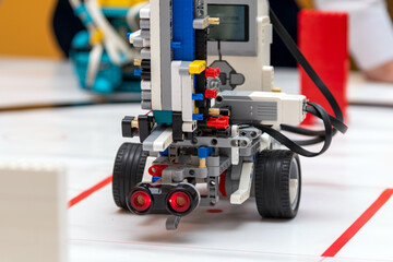 Fototapeta premium robot in the center of the playground close-up