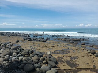 Enjoying the ocean view at Yeh Leh beach, Bali.