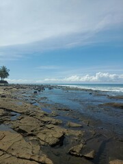 Enjoying the ocean view at Yeh Leh beach, Bali.
