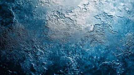 Obraz premium a close-up shot of an icy, textured surface with shades of blue and gray, creating an abstract pattern