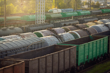 Freight wagons in railway. Dead end on railway station with cargo wagons and cisterns. Sorting...