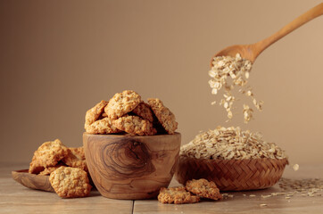 Oatmeal cookies on a beige background.