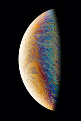 A black background with half of a soap bubble. Bright, colorful fantastic patterns.