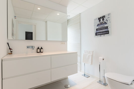 an image of a minimal bathroom design in luxury mediterranean real estate  - Powered by Adobe