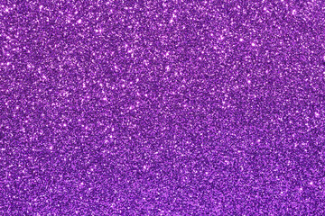 A purple background with glittery purple dots