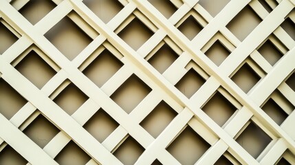 Abstract pattern featuring geometric shapes and lattice design in muted tones creating a visually appealing backdrop for creative projects.