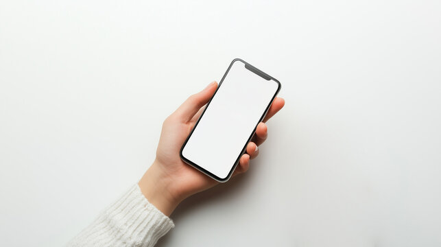 M&atilde;o segurando celular com tela em branco mockup