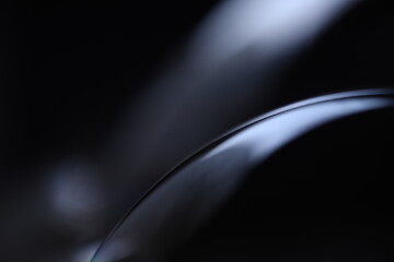 	
Bright liquid silver line on black background, phenomenal rainbow reflection, beautiful physical effects, glossy metal texture 