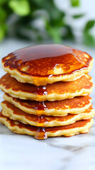 Stack of Pancakes with Syrup on Marble