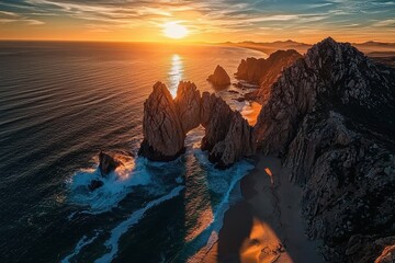 Obraz premium Dramatic sunset lighting highlights the arch in Baja California