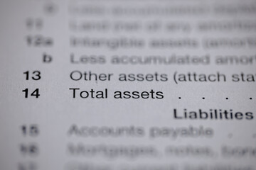 A close-up of a financial document showing the line item 