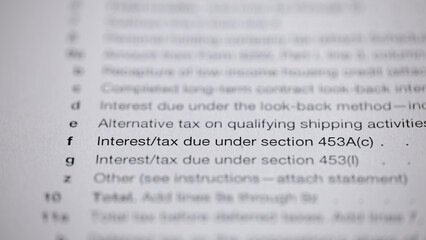 Tax form excerpts detail interest/tax specifics under Sections 453A(c) & 453(l), alternative shipping tax, and completed long-term contract look-back interest.