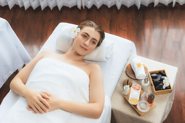Caucasian woman customer enjoying relaxing anti-stress spa massage and pampering with beauty skin...