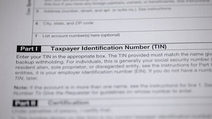 Fototapeta premium Taxpayer Identification Number (TIN) Form. Enter your TIN in the box matching the name given to avoid backup withholding. The form has space for listing account number(s).