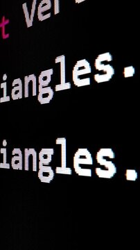 Closeup macro shot movement of coding script moving across LED screen with real-time AI-generated typing, showcasing advanced AI learning in optimization, debug and coding for software development.