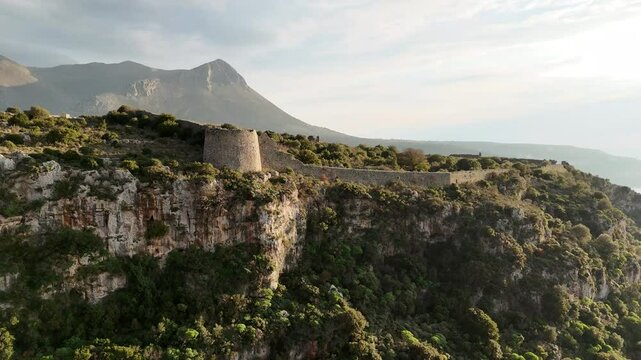 Aerial view of Kelefa Castle and its tower and walls during sunset, Mani, Laconia, Greece.