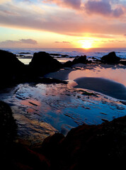 Sunset at Seal Rock National Park . North Pacific Ocean Oregon Coast. Tide pools reflecting the...