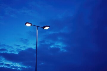 Illuminated Billboard Mockup Against a Clear Blue Sky for Dynamic Advertising Opportunities