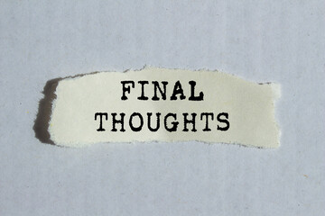 Final thoughts message written on ripped torn paper piece on gray background. Conceptual final thoughts symbol. Copy space.