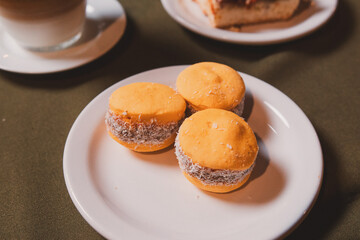 Sweet dough served on a small plate in a restaurant.